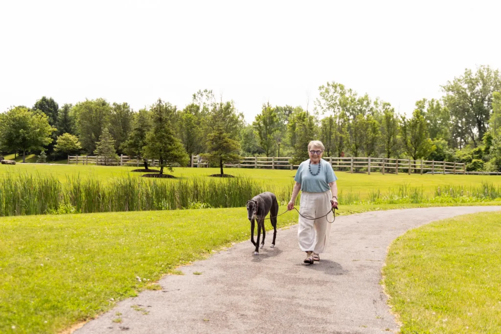 CBW-W resident walks dog: what is senior living without our pets?